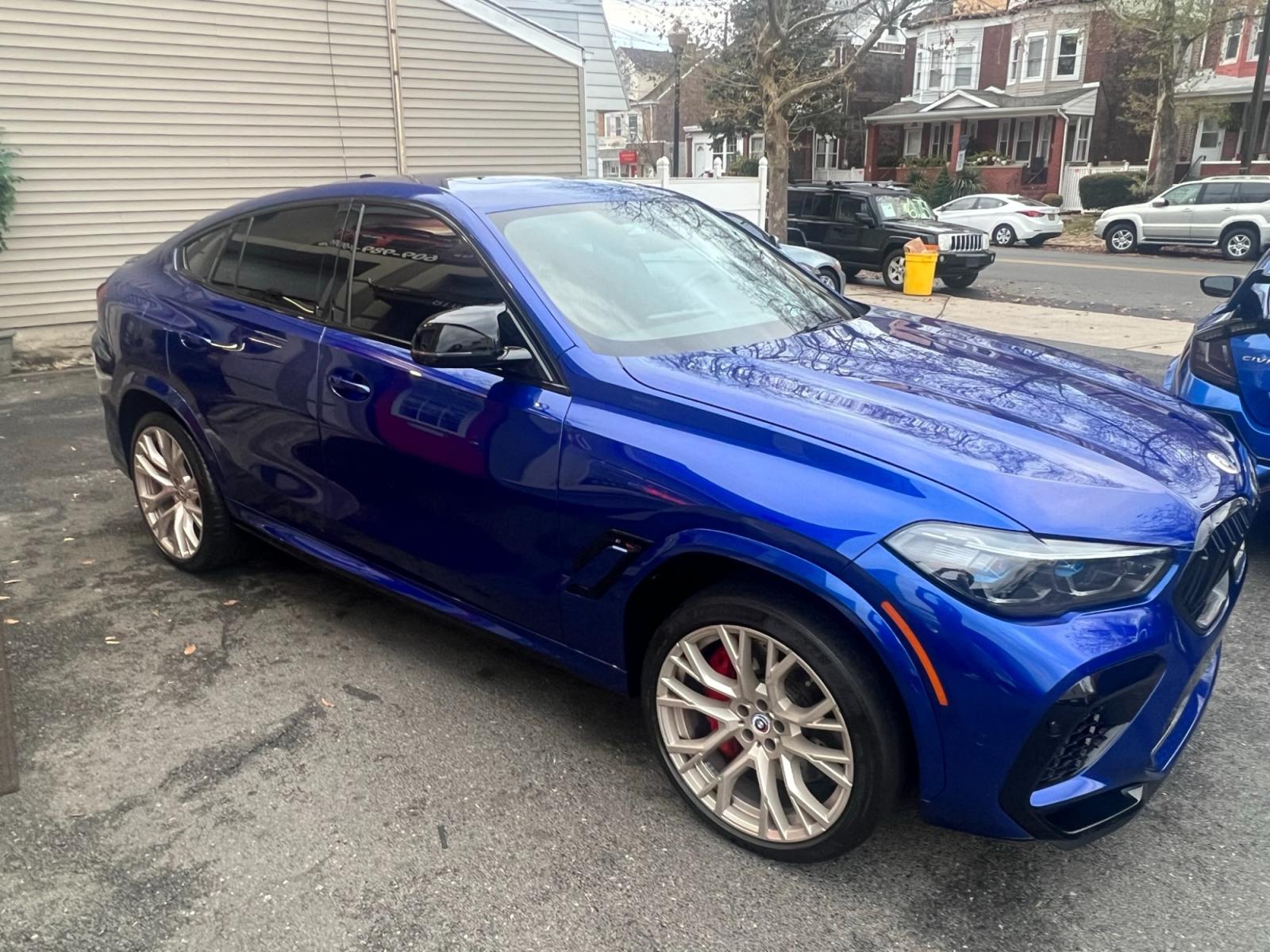 2022 Blue /Red/Black BMW X6 M Base (5YMCY0C07N9) with an 4.4L V8 DOHC 32V engine, 8A transmission, located at 1018 Brunswick Ave, Trenton, NJ, 08638, (609) 989-0900, 40.240086, -74.748085 - Holy Cow and Wow!!...That is the description on this absolutely stunning BMW X6 M Competition! Ordered by Anthony himself with the best color choice of Marina Bay Blue metallic and Red Interior to stand out on the road and to any enthusiast of the BMW X series! Executive Pkg. includes Remote Start, - Photo #21